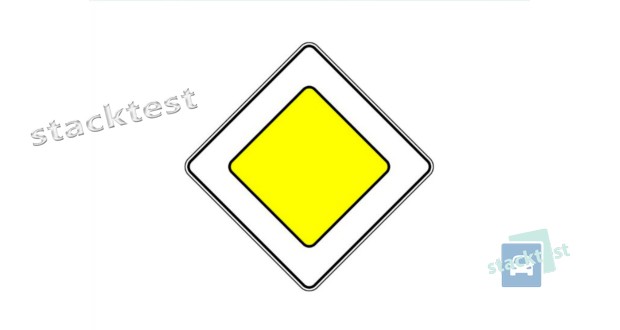 Показанный на рисунке дорожный знак, расположенный перед перекрёстком в населённом пункте, предоставляет преимущество при проезде: