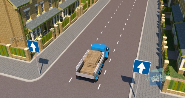 На якому боці дороги з одностороннім рухом в населеному пункті водієві вантажного автомобіля з дозволеною максимальною масою понад 3,5 т дозволено зупинитися?