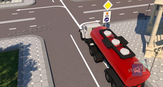У яких напрямках дозволено рух вантажного автомобіля в зображеній ситуації?