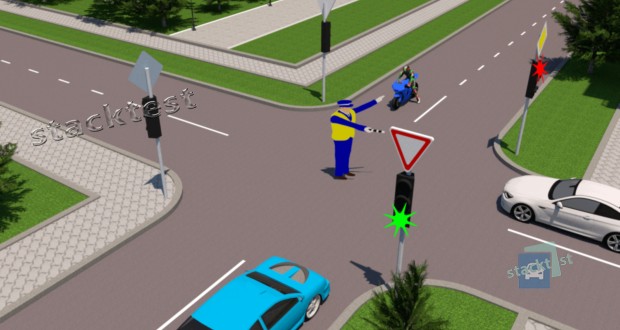 На даному перехресті водії та пішоходи повинні керуватися: